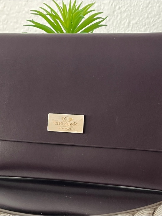 kate spade Handbags - kate spade Plum Leather Wallet with Gold Logo Plate